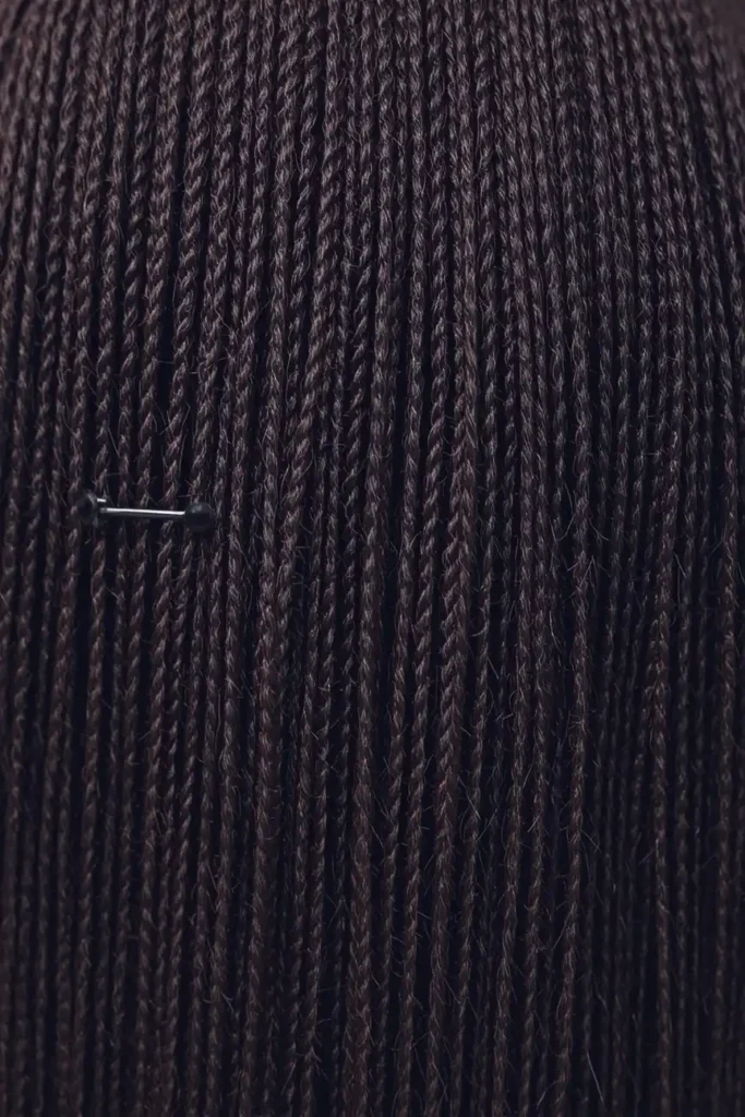 Pinned-Back Crimped Style on Dark Hair