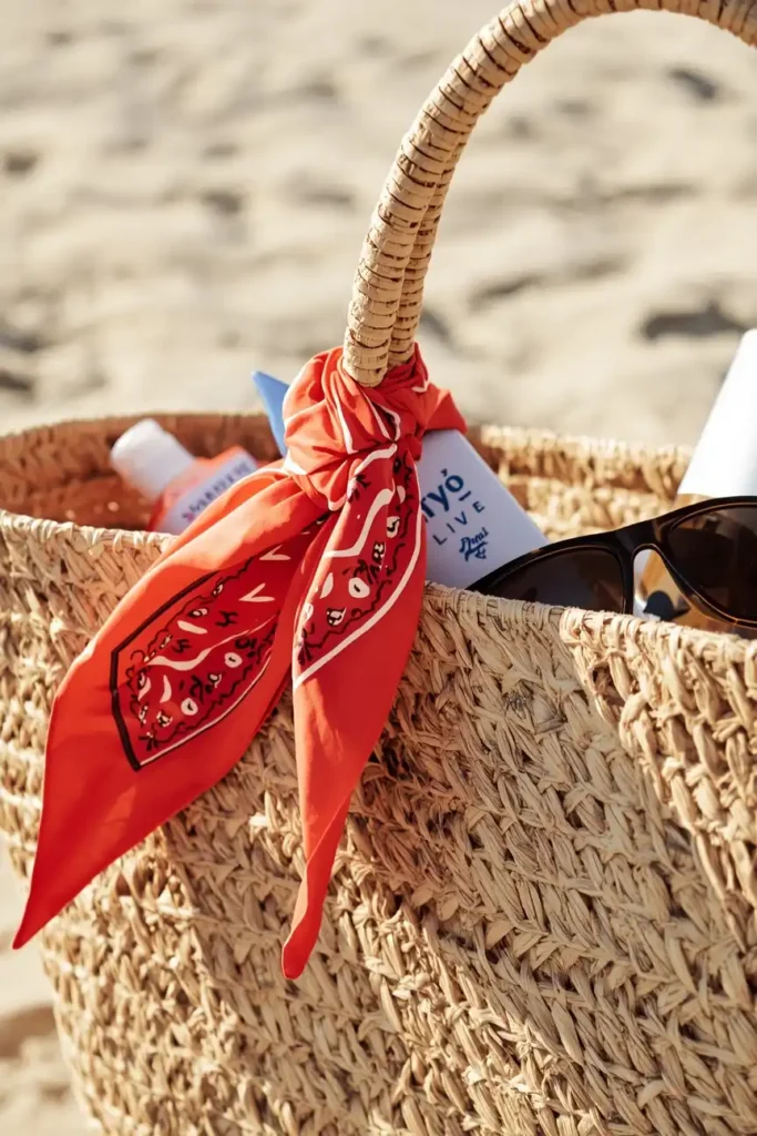 Bandana Tied on a Straw Bag for a Beach Look