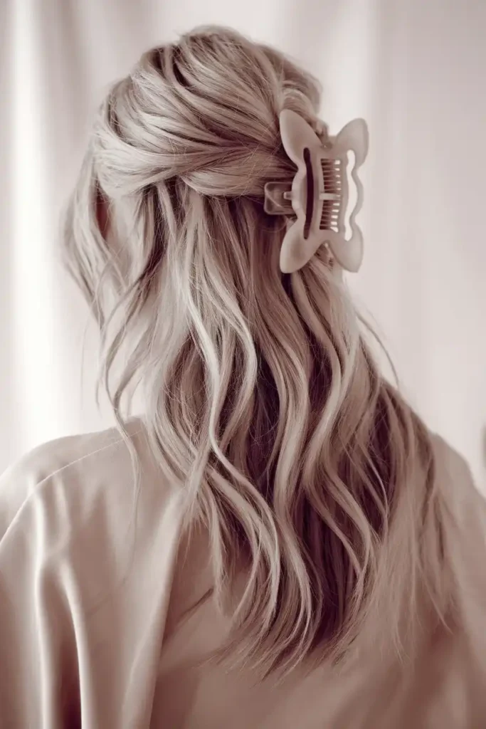 Half-Up Wavy Style With Butterfly Clip Accent