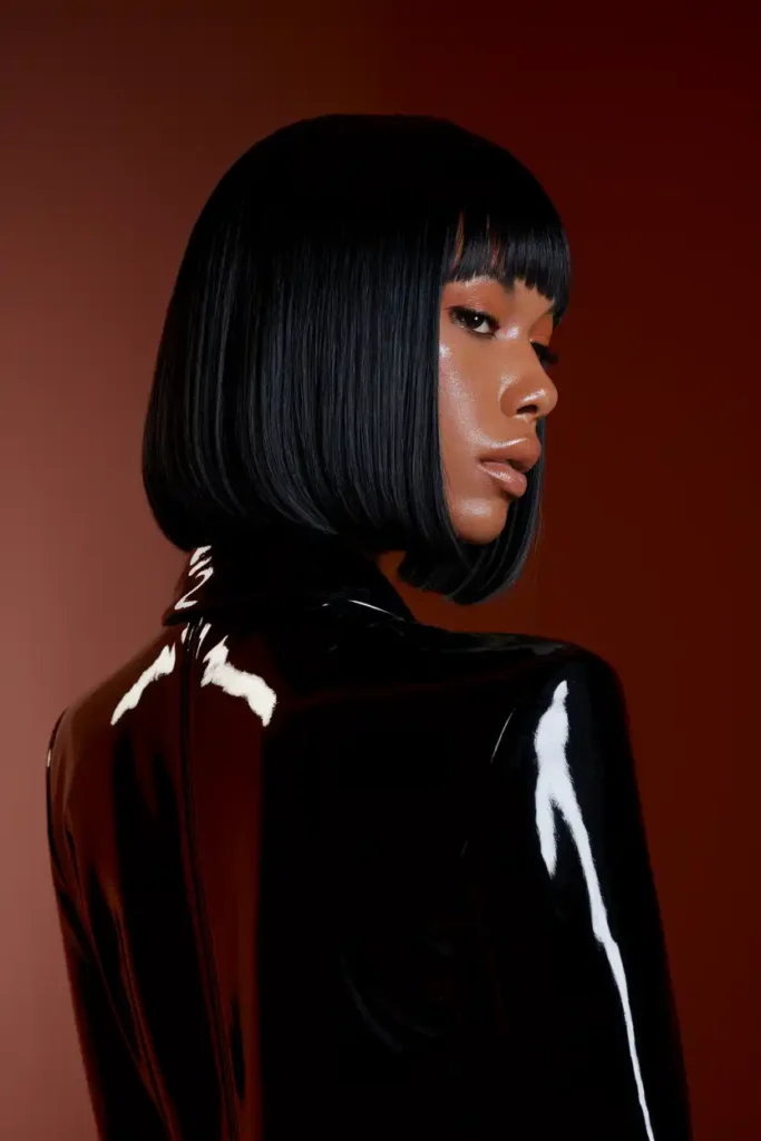 Glossy Black Straight Cut for Warm Skin Tones

