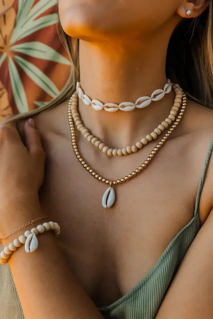Shell and Bead Jewelry Stacked With Tropical Coordinates
