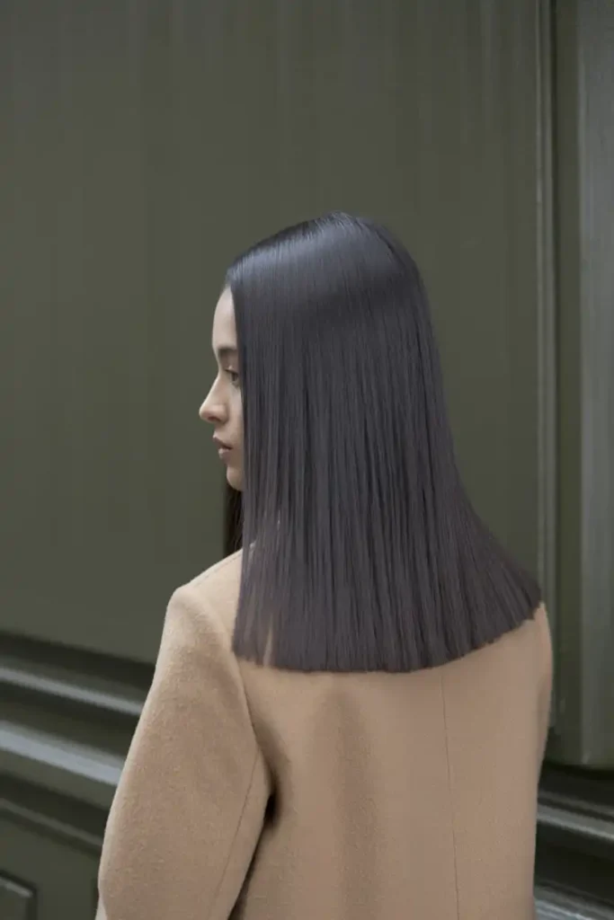 The Sleek Middle Part With Tucked Ends
