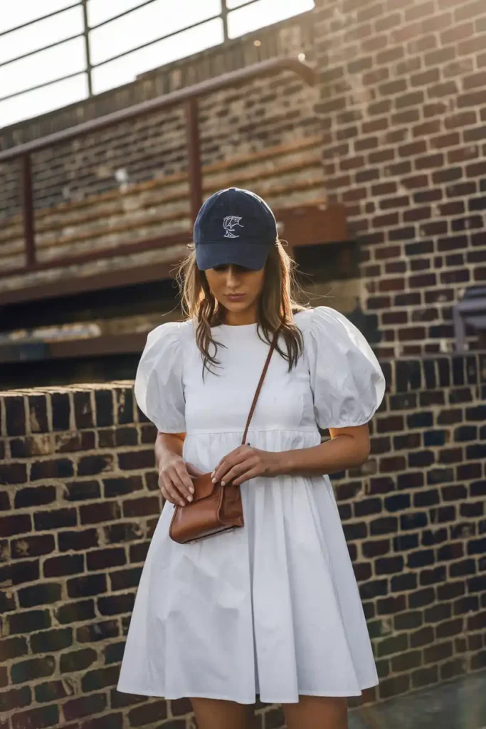 White Summer Dress with a Baseball Cap